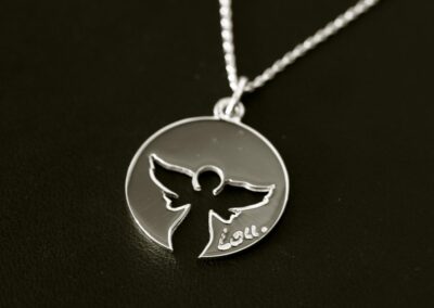 Médaille UN ANGE PASSE Or gris